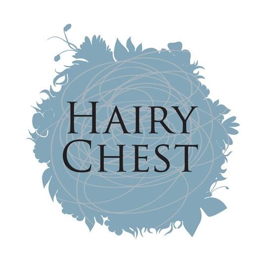 hairy chest coffee logo, features a semi serif palatino looking smallcaps font against a color one might describe as slate blue